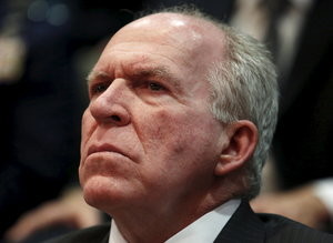 CIA Director John Brennan listens to remarks by U.S. President Barack Obama at the Director of National Intelligence Office to mark its 10th anniversary, in McLean, Virginia, April 24, 2015. REUTERS/Yuri Gripas