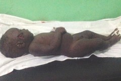 An infant killed in the Nuba Mountains, May 23, 2016